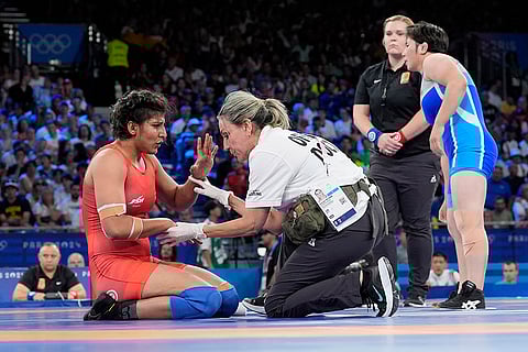 Nisha Dahiya during women's freestyle 68kg wrestling quarterfinal match against Sol Gum Pak